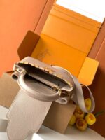 Louis Vuitton Capucines handbag in a beige - Image 4