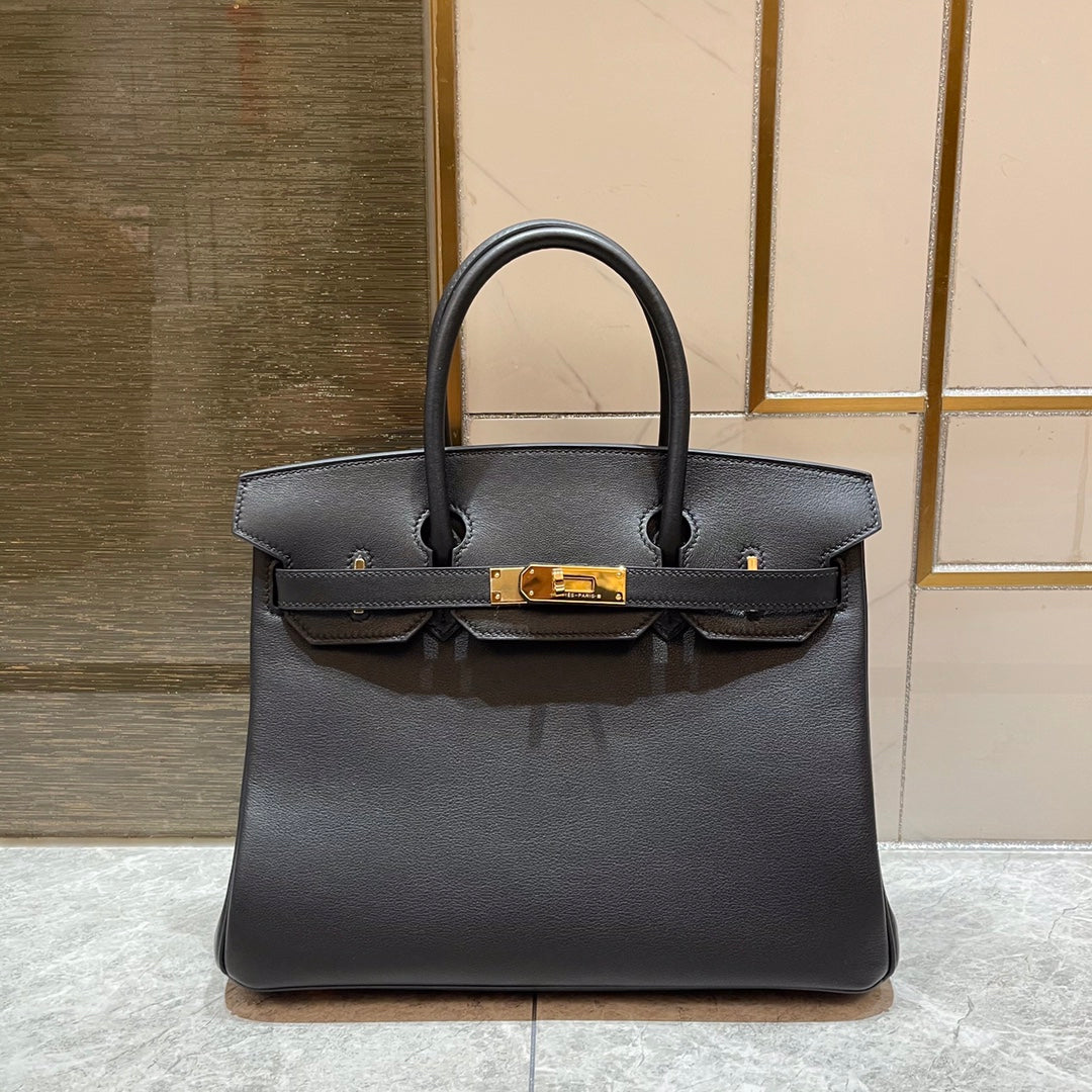 13342606784467823_5300268c-2446-4e9d-9261-19f14dad7a7f.jpg HN 30CM BLACK SWIFT LEATHER GOLD HARDWARE - Image 1
