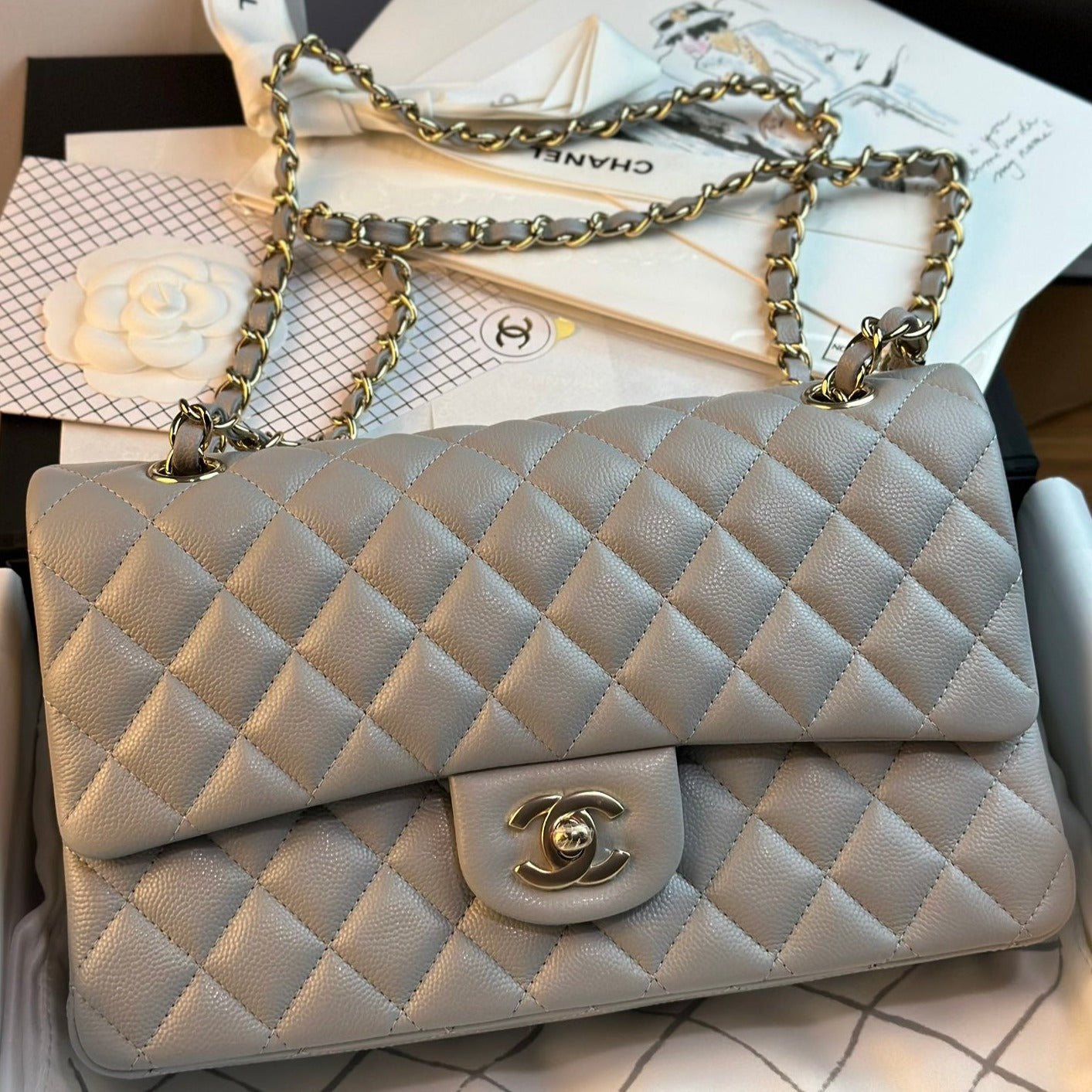 13350819334498152_4ffdd83d-db61-4faf-92c0-a6ed2f7bfc97.jpg CHANEL FLAP BAG 25CM GOLD HARDWARE GREY CAVIAR - Image 1