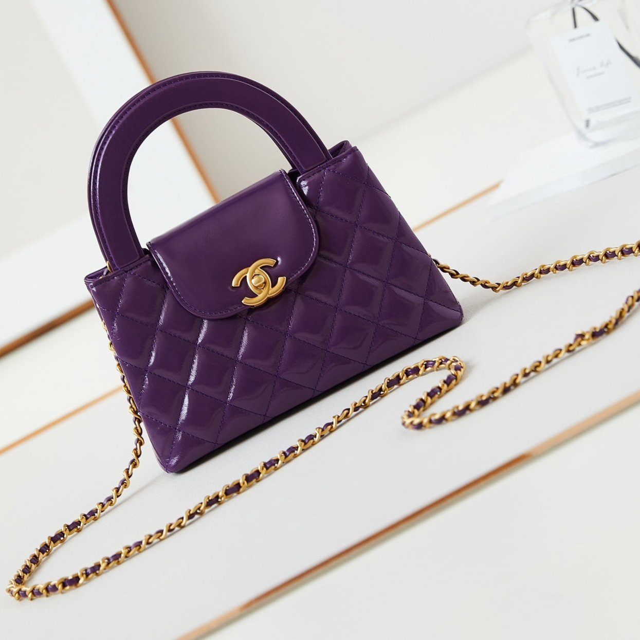 20240527_i1716746700_1675_0_jpg-1.jpg CHANEL KELLY MINI 19 BAG IN INDIGO PURPLE CALFSKIN - Image 1
