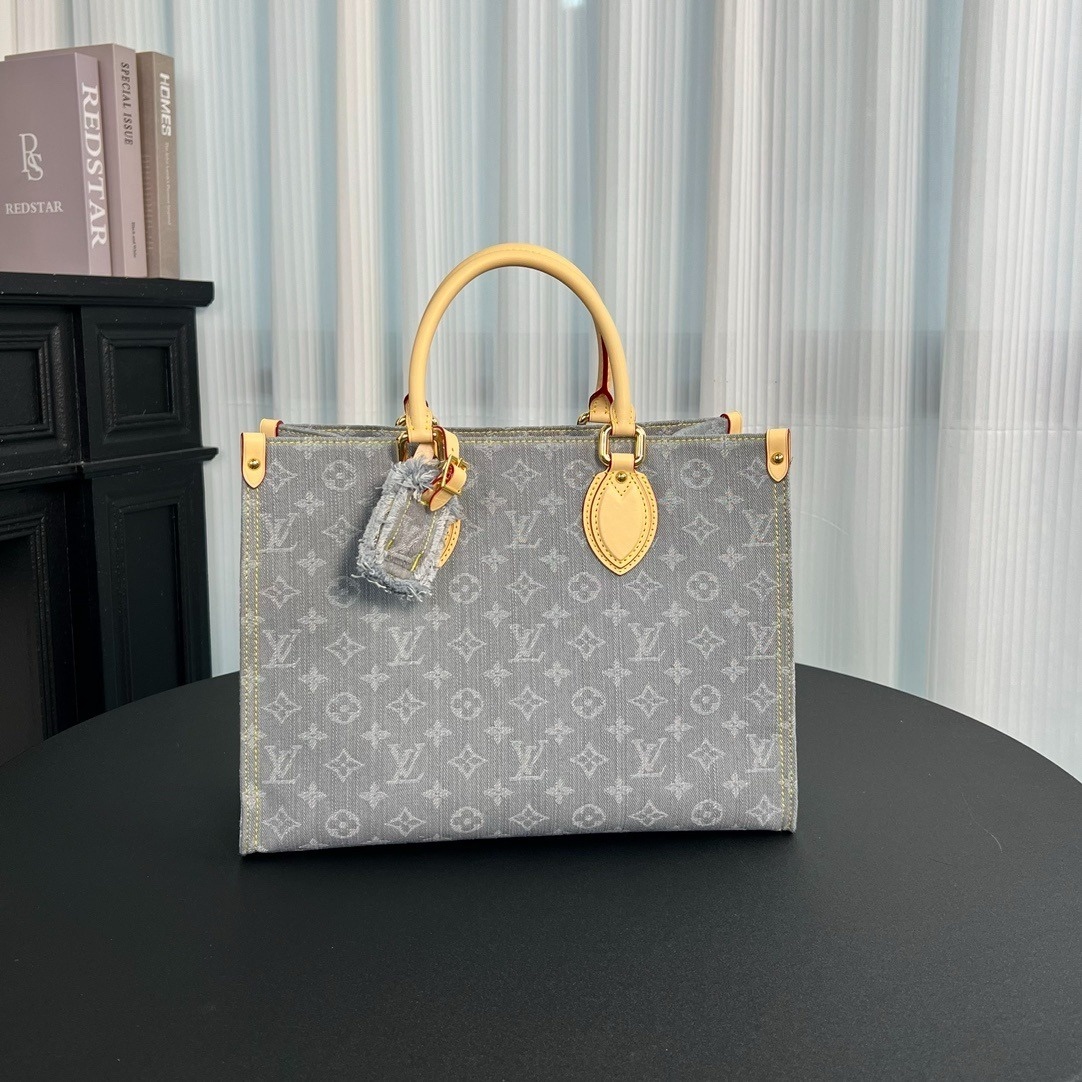 20aa64b8-ebaf-45ce-bd35-f2948ba77fc2-4.jpeg Louis Vuitton OnTheGo MM Tote Bag in Denim - Image 1