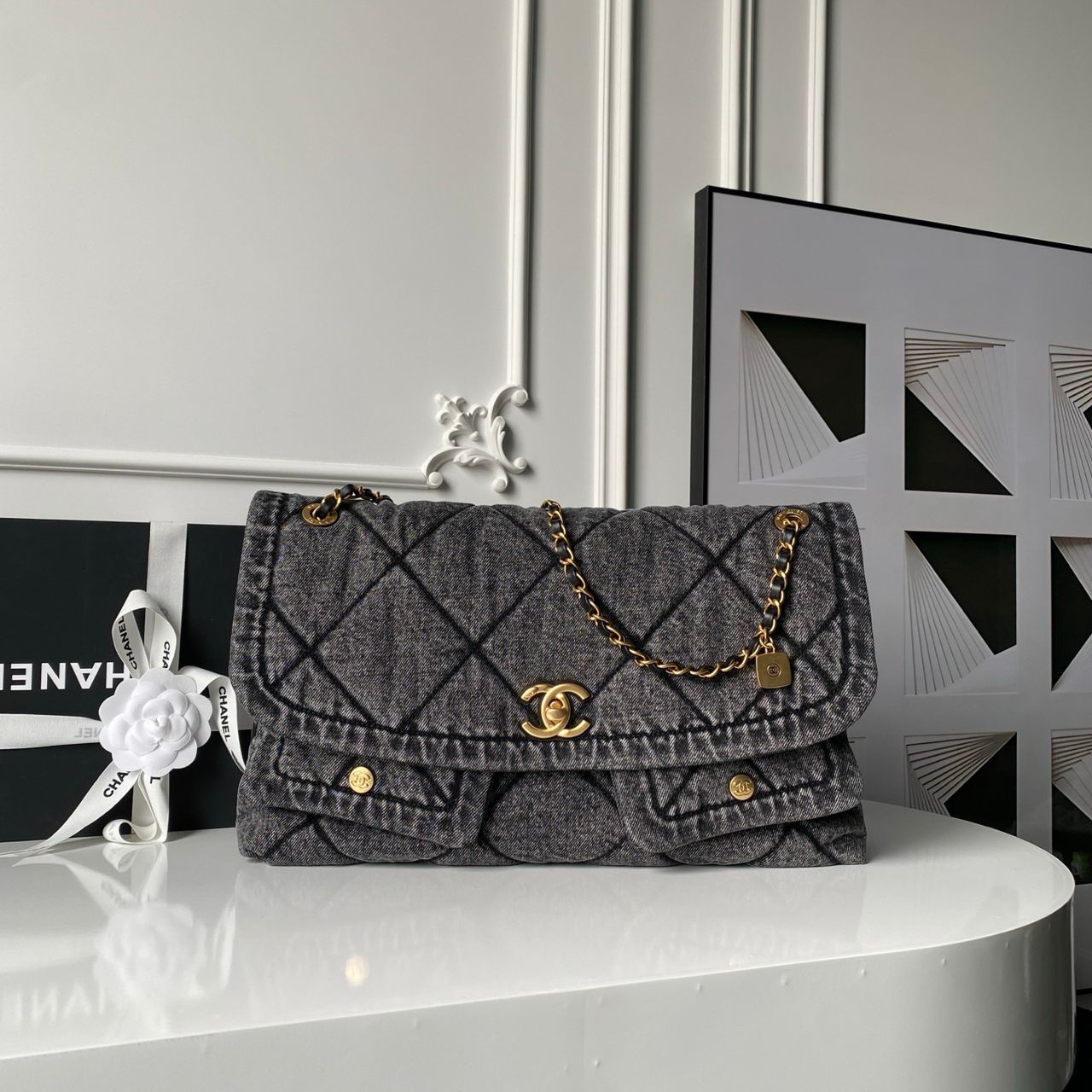 2bd44291-6c5e-458a-95ea-485a643e9b5f-1.jpeg Chanel Maxi Flapbag in washed denim with gold-tone metal hardware - Image 1