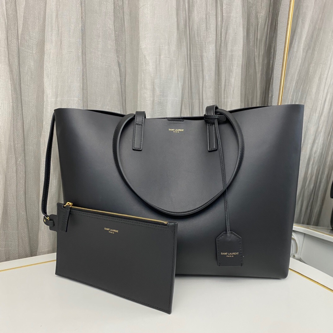 466459bf.jpg SAINT LAURENT East West grained leather tote - Image 1