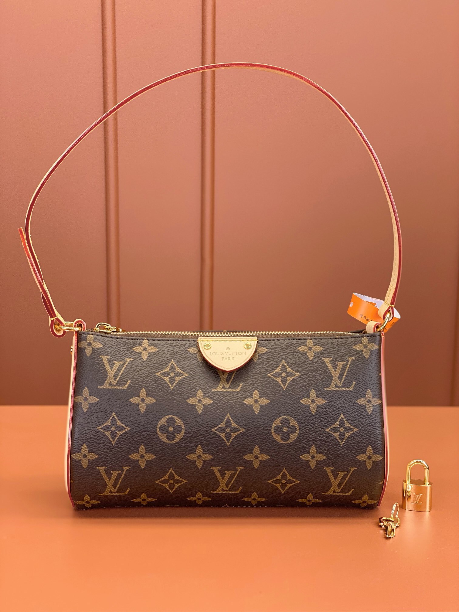 497a1ace-1.jpg Louis Vuitton Pochette Tirette bag in monogram coated canvas - Image 1