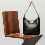 Chanel 25P Hobo bag in black lambskin