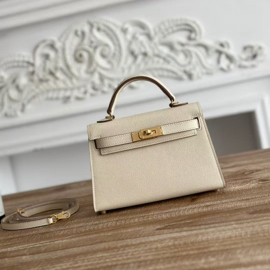 Image_20250423002713_2048x2048.jpg HN MINI 19 WHITE CALFSKIN GOLD HARDWARE - Image 1