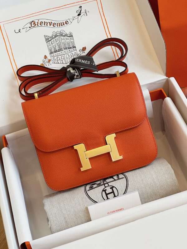 Tui-Hermes-Constance-Bag-Epsom-Gold-Mau-Cam-Sieu-Cap-19cm-1-600x800-1.jpg HN Bag Epsom Gold Orange Like Auth Handbags 19cm - Image 1