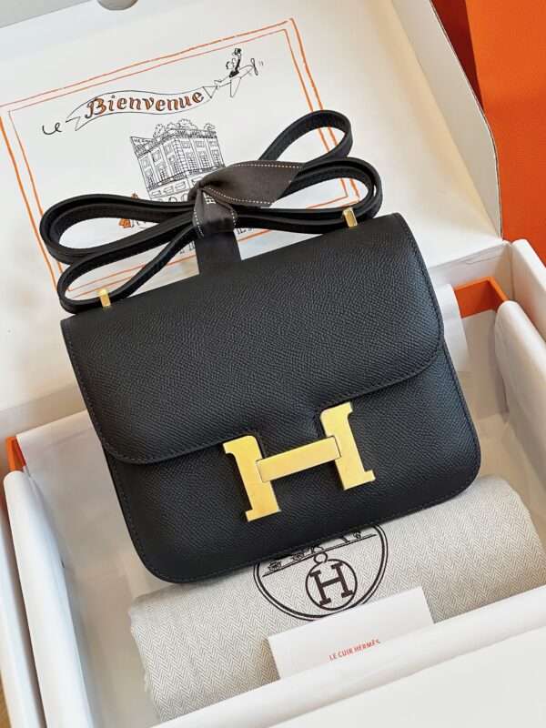 Tui-Hermes-Constance-Bag-Epsom-Gold-Mau-Den-Sieu-Cap-19cm-5-600x800-1.jpg HN Bag Epsom Gold Black Handbags 19cm - Image 1