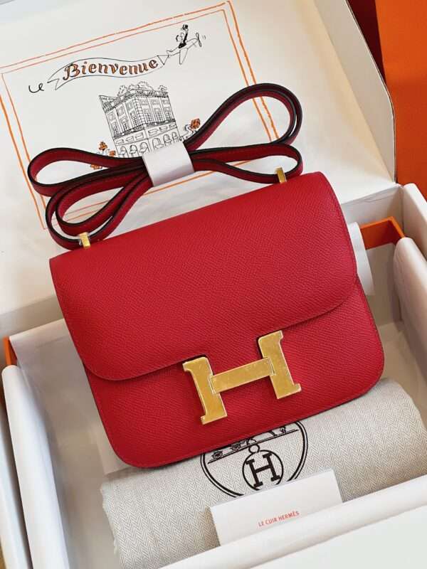 Tui-Hermes-Constance-Bag-Epsom-Gold-Mau-Do-Tuoi-Sieu-Cap-19cm-3-600x800-1.jpg HN Bag Epsom Gold Red Handbags Lock Gold Like Auth 19cm - Image 1