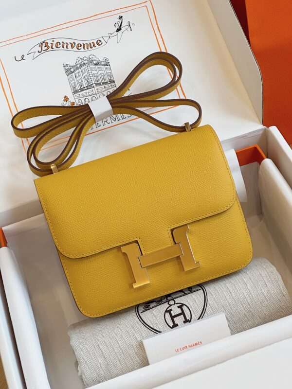 Tui-Hermes-Constance-Bag-Epsom-Gold-Mau-Vang-Sieu-Cap-19cm-9-600x800-1.jpg HN Bag Epsom Gold Yellow Handbags 19cm - Image 1