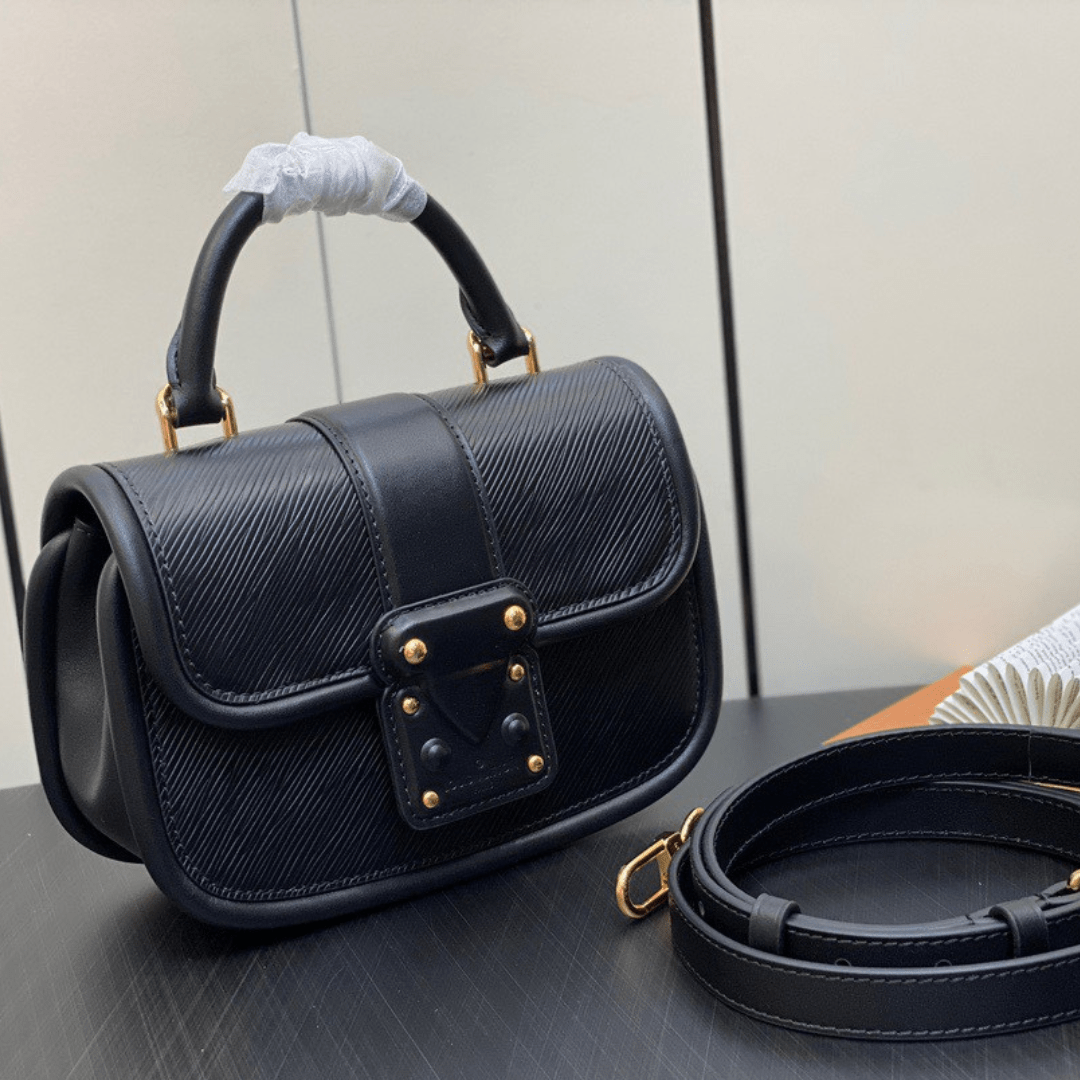 Untitled-design-2025-05-27T042702.402.png Louis Vuitton Hide and Seek Bag Black Woman’s Handbags 21x15x8cm - Image 1