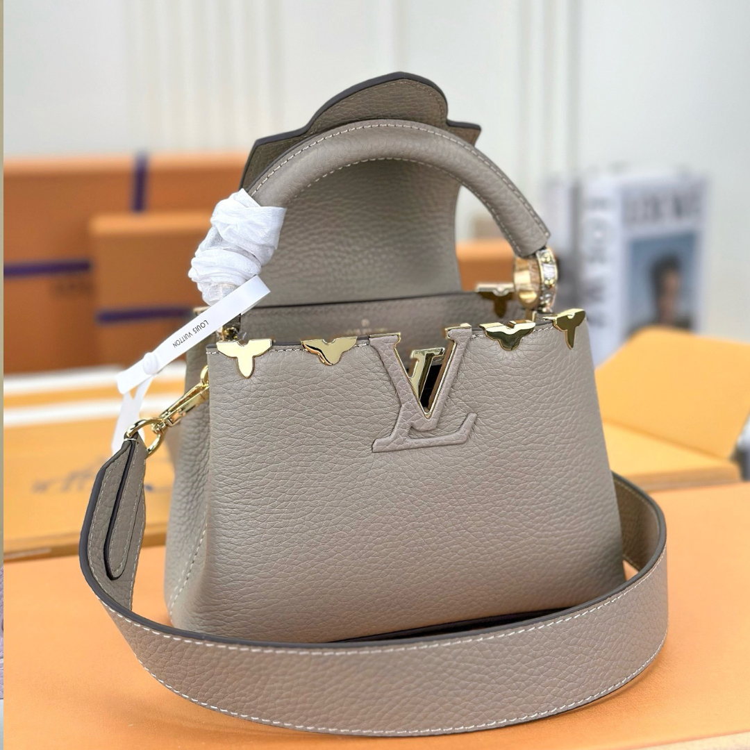 Untitled-design-2025-05-27T073710.210.png Louis Vuitton LV Capucines Lock Gold Handbags Cowhide Leather 21cm - Image 1