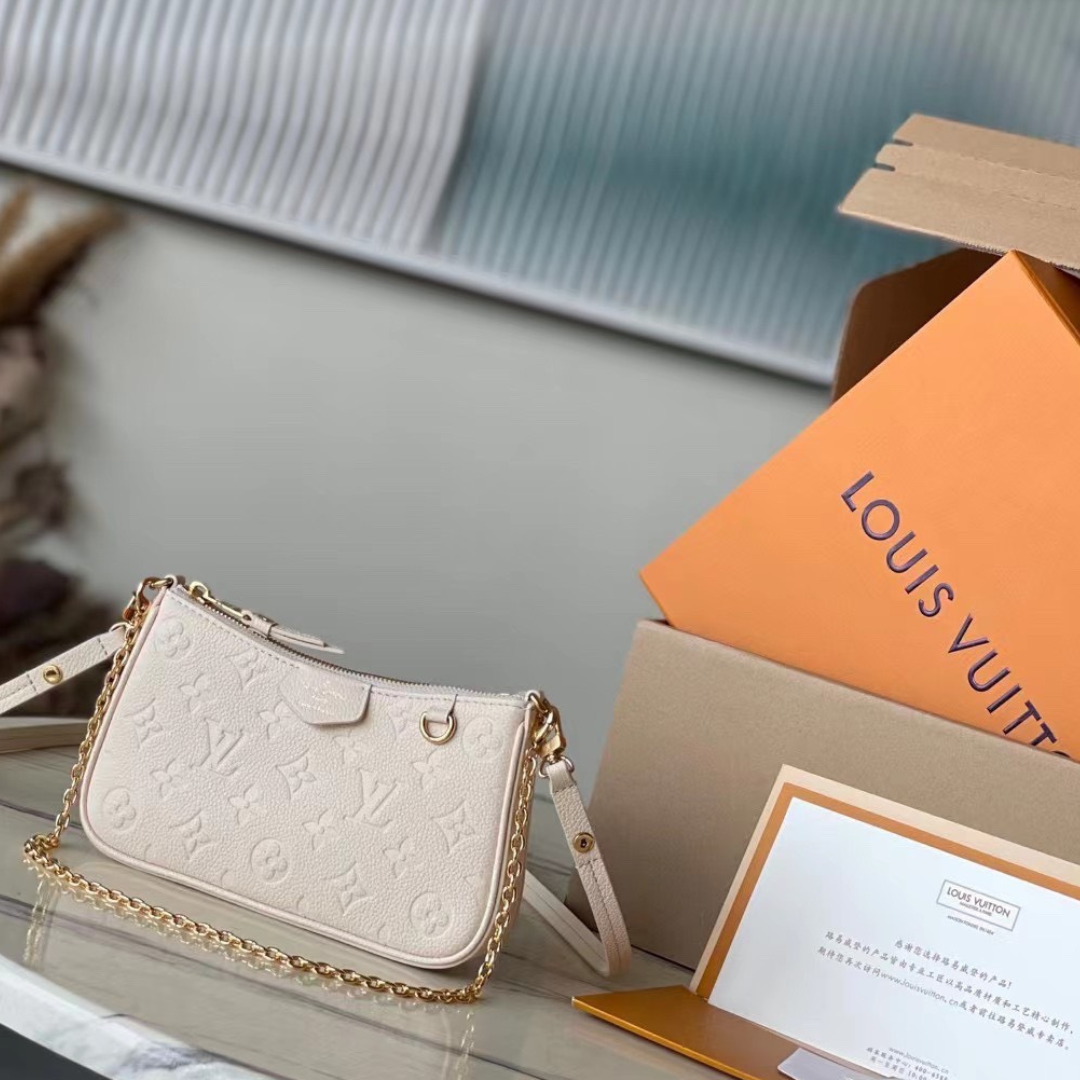 Untitled-design-2025-05-28T054346.654.png Louis Vuitton LV Easy Pouch On Strap Handbags White Milk 19×11.5x3cm - Image 1