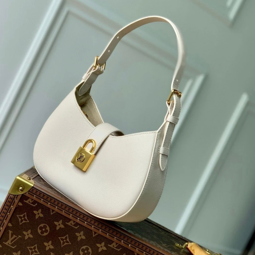 Untitled-design-2025-05-28T062154.039.png Louis Vuitton LV Lowkey Lock Pattern Woman’s Handbags 26x18x7cm - Image 1