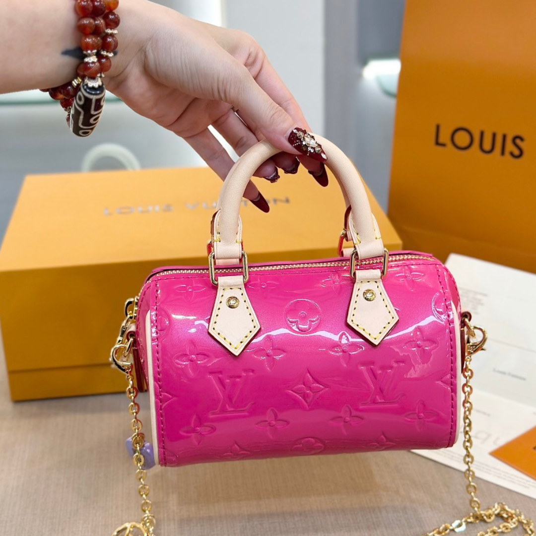 Untitled-design-2025-05-28T111013.723.png Louis Vuitton LV Nano Speedy Pink Shiny Leather Handbags 16x10x7,5cm - Image 1