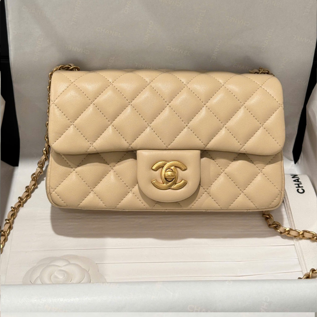 Untitled-design-2025-05-28T174534.281.png Chanel Classic Bell Bag 11 Handbags Beige Leather Lock Gold 20cm - Image 1