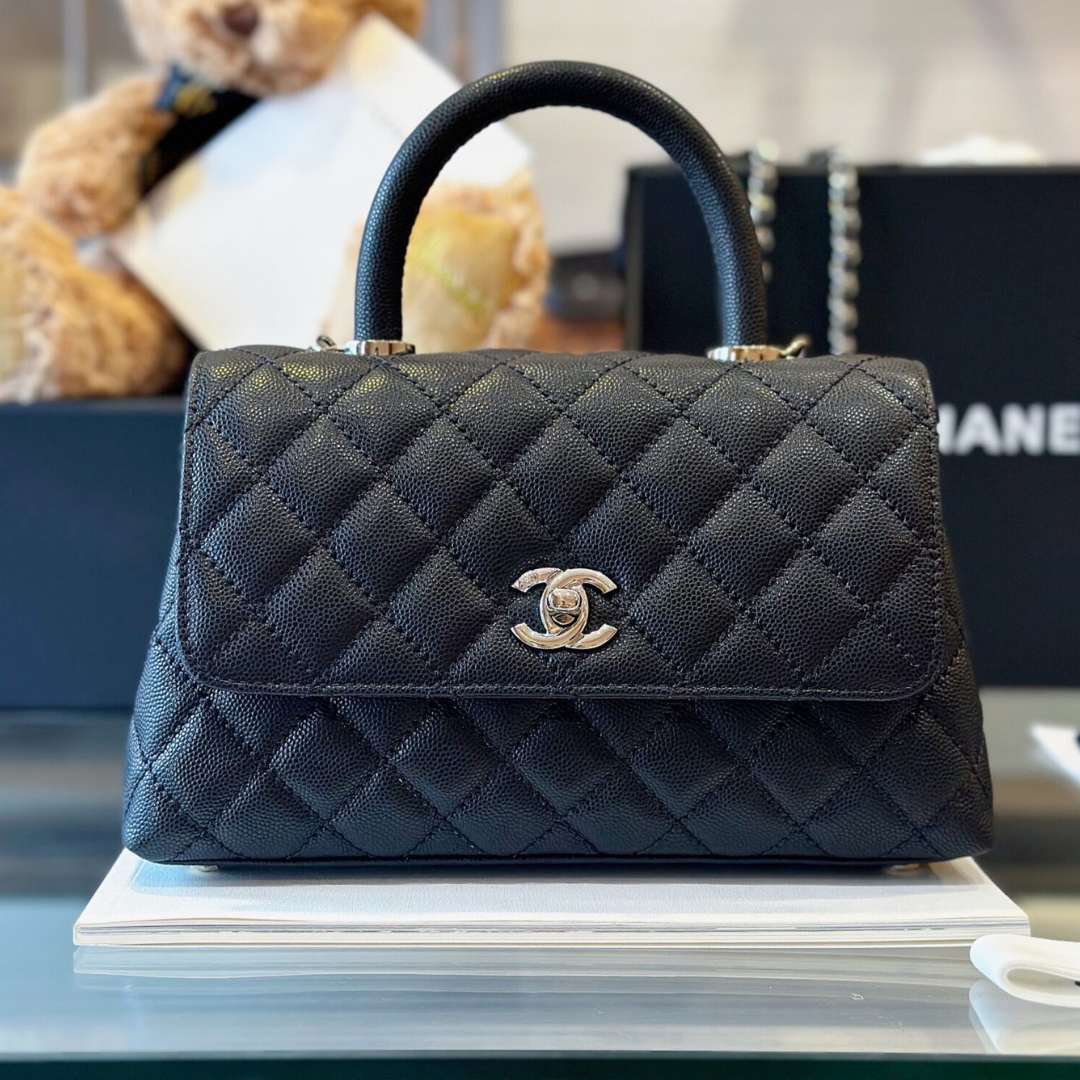 Untitled-design-2025-05-28T180653.379.png Chanel Coco Handbag Leather Black With Silver Lock 23cm - Image 1