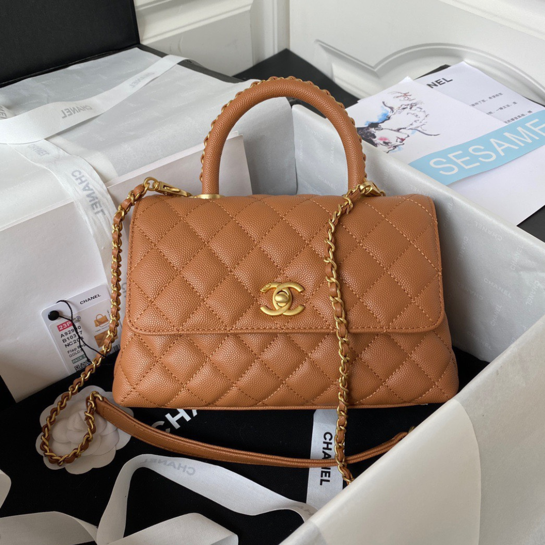 Untitled-design-2025-05-29T011935.836.png Chanel Coco Brown Leather With Lock Gold Handbags 24cm - Image 1
