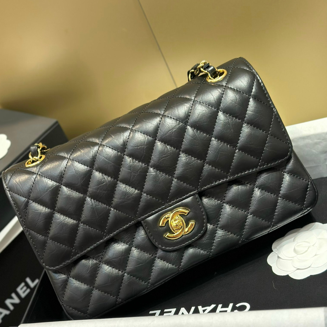 Untitled-design-2025-05-29T025032.880.png Chanel Classic Lock Gold With Black Wrinkled Skin Like Auth Handbags 25cm - Image 1