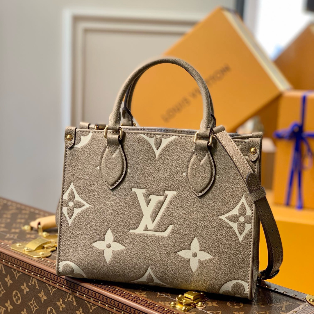 Untitled-design-2025-06-02T035155.716.png Louis Vuitton LV Onthego Woman’s Grey Cowhide Leather Handbags 25cm - Image 1