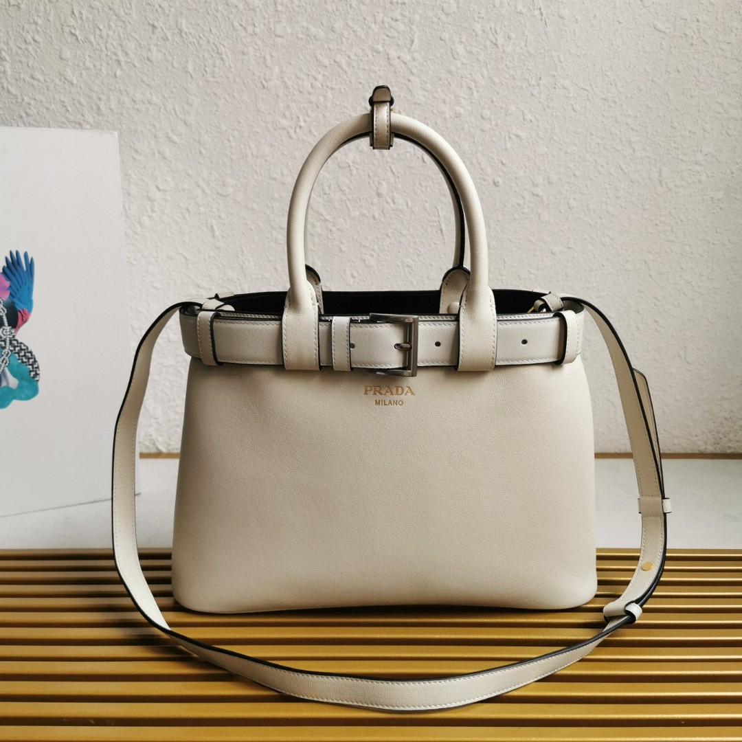 Untitled-design-2025-08-13T210152.549.png Prada White/Black Prada Buckle small leather handbag with belt - Image 1