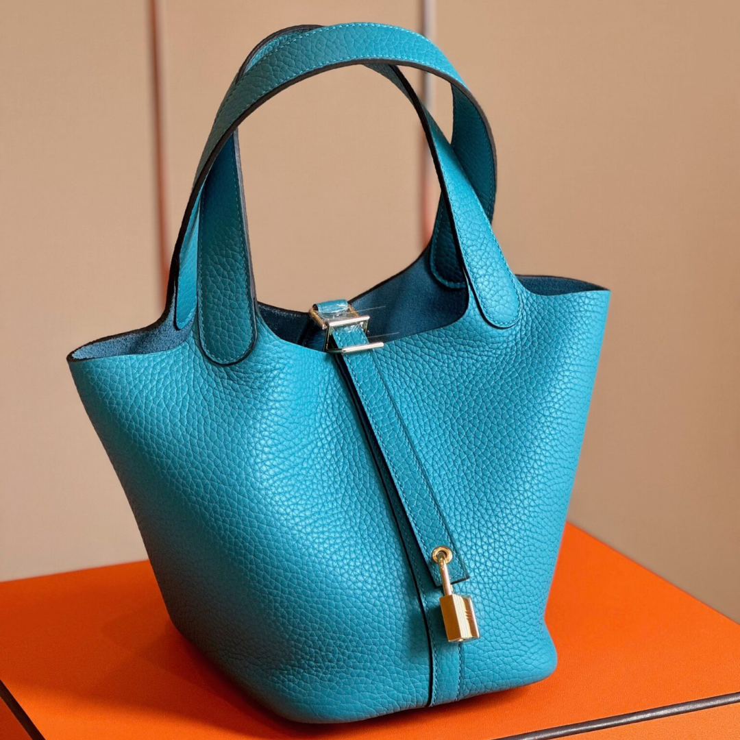 Untitled-design-2025-09-30T060335.024.png HN 18 Blue Togo Leather Gold Hardware - Image 1