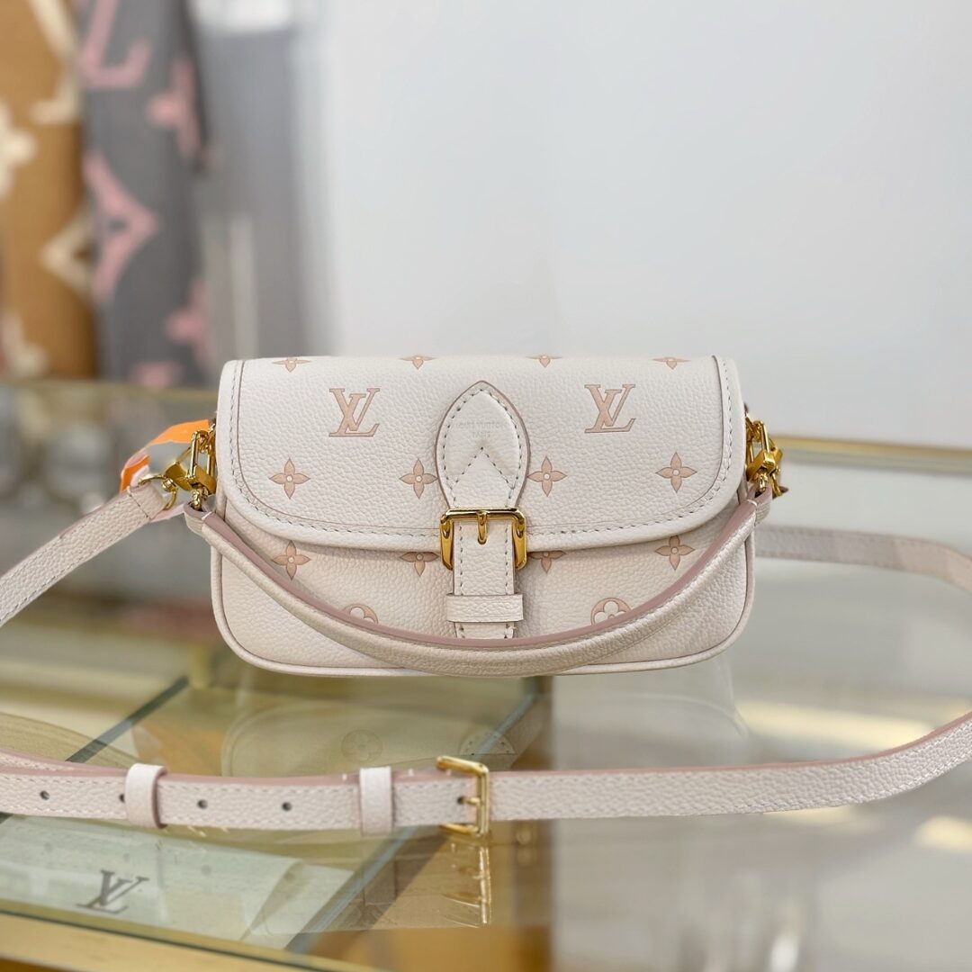 Untitled-design-2025-12-28T165645.481.jpg Louis Vuitton Nano Diane bag in cream Monogram Empreinte - Image 1