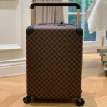 Louis Vuitton Horizon 55 rolling suitcase in Damier Ebene canvas.