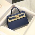 HN Mini Kelly Blue with gold-tone hardware