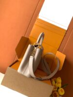 Louis Vuitton Capucines handbag in a beige - Image 5