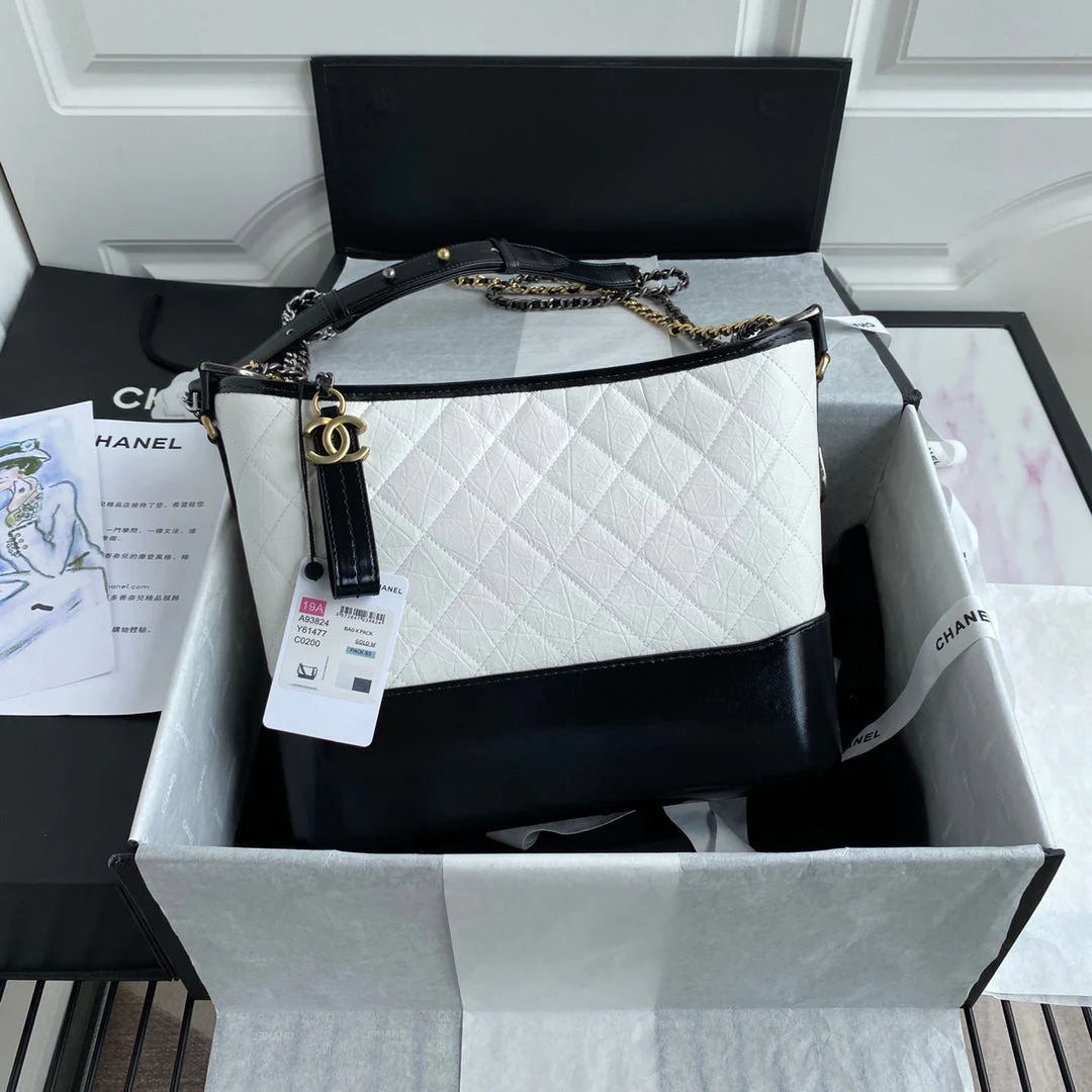 img_0375-1.png CHANEL GABRIELLE MEDIUM 28 HOBO BAG IN BLACK MIX WHITE CALFSKIN - Image 1