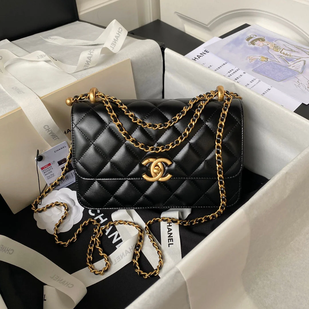 img_0539-1.png CHANEL FLAP BAG 22 IN BLACK CALFSKIN WITH DOUBLE GOLD BALL - Image 1