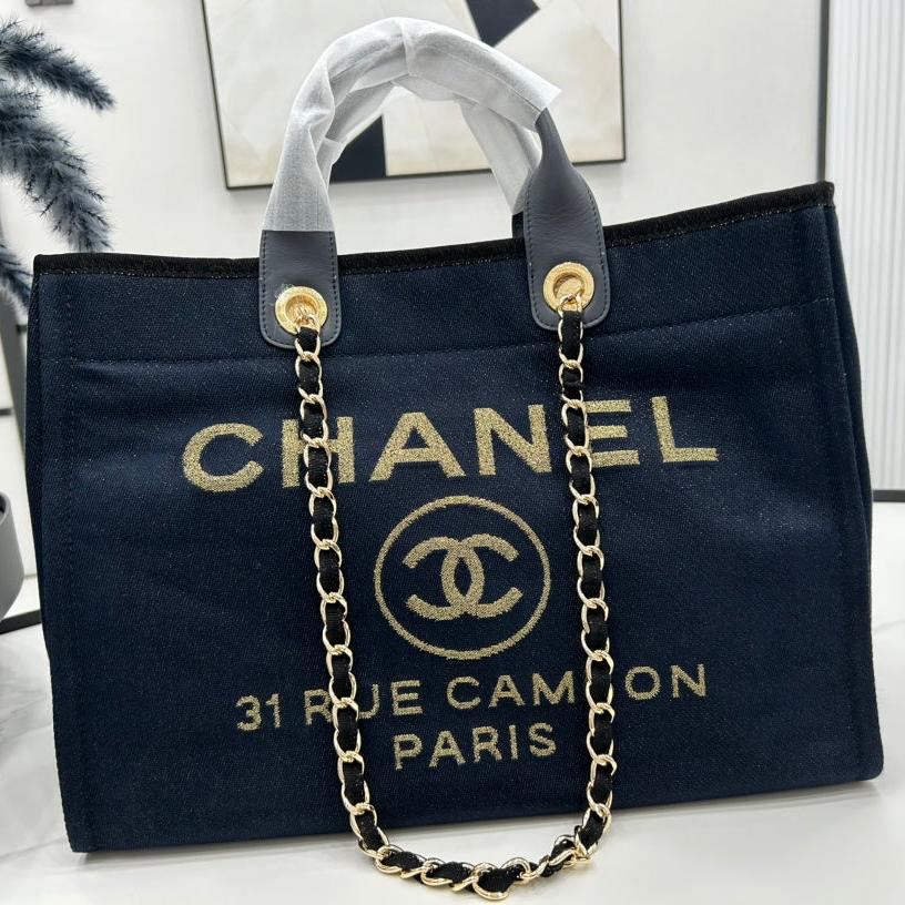 img_0602-1.png CHANEL DEAUVILLE LARGE 38 TOTE BAG IN BLACK CANVAS WITH GOLD EMBROIDERED LOGO - Image 1