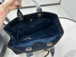 CHANEL DEAUVILLE LARGE 38 TOTE BAG IN BLACK CANVAS WITH GOLD EMBROIDERED LOGO - Image 2