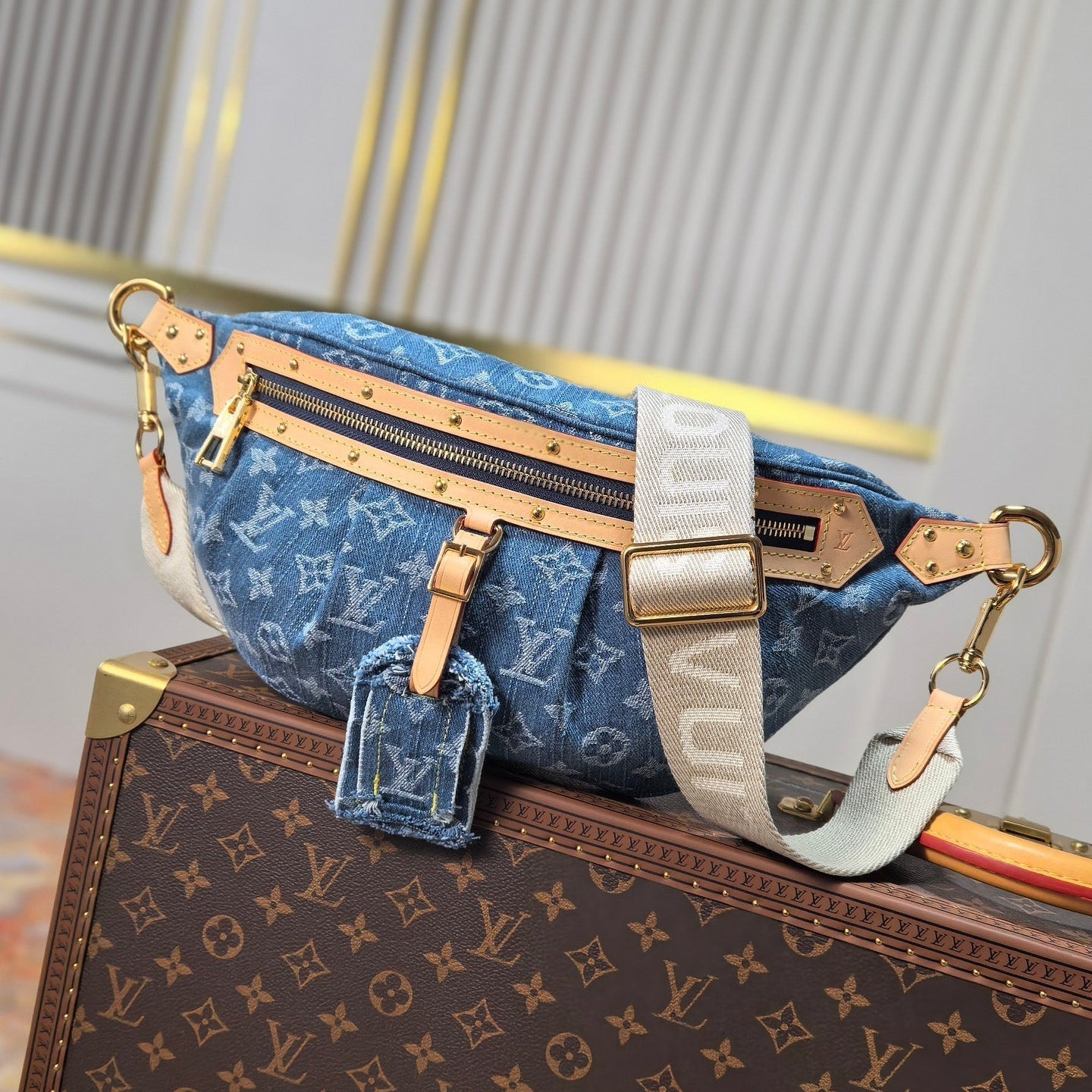 img_0f11e37c_20250707_i1751869583_8580_0_jpg.jpg LV 25S BUMBAG 38 IN BLUE MONOGRAM DENIM LEATHER TRIM GOLD HARDWARE - Image 1