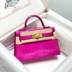 HN MINI IN DEEP MAGENTA CROCODILE SKIN GOLD HARDWARE