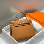 HN 25CM IN GOLD EPSOM SILVER HARDWARE