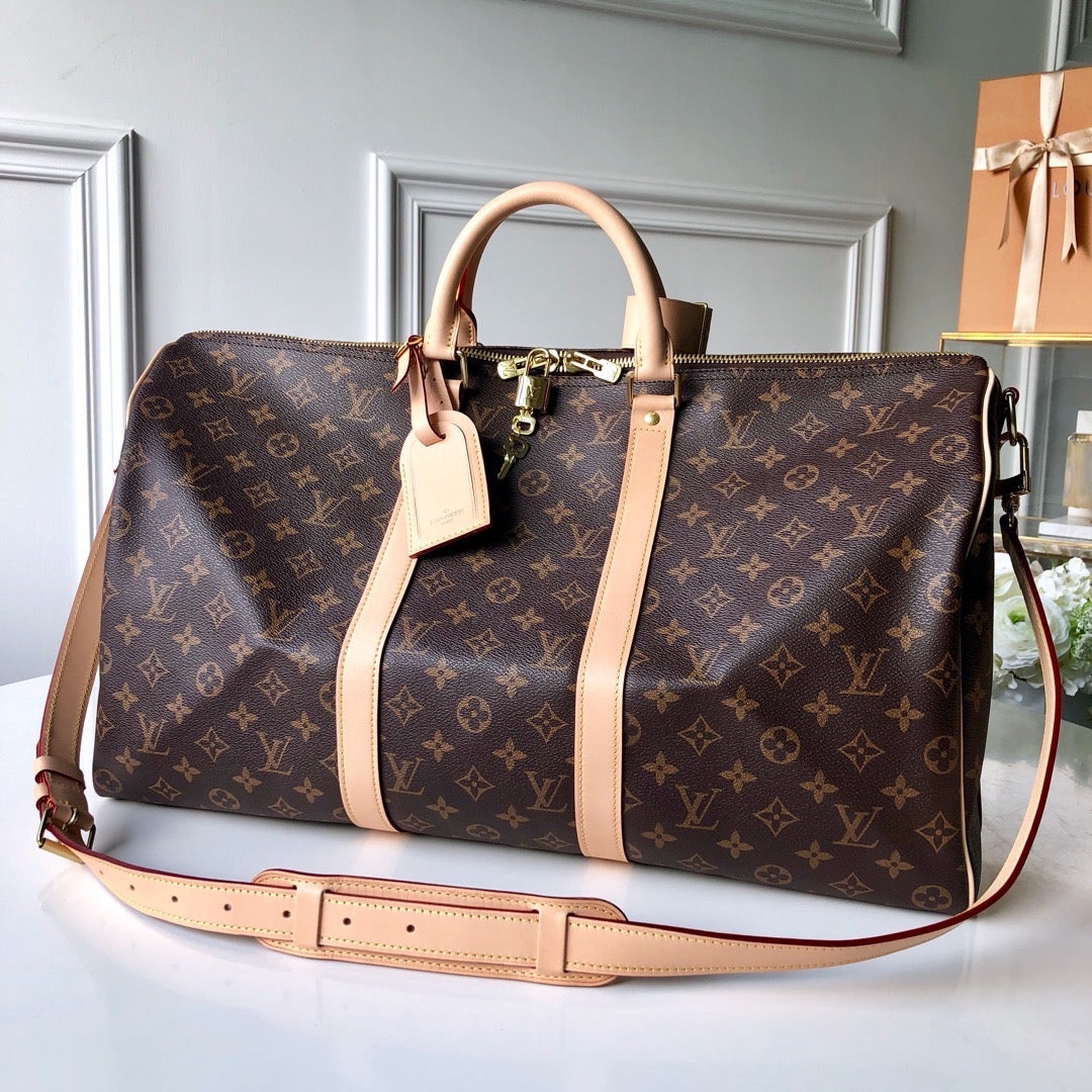 img_6674-1.jpeg LV Monogram Canvas Keepall Bandoulière 55 Leather Duffle Bag - Image 1