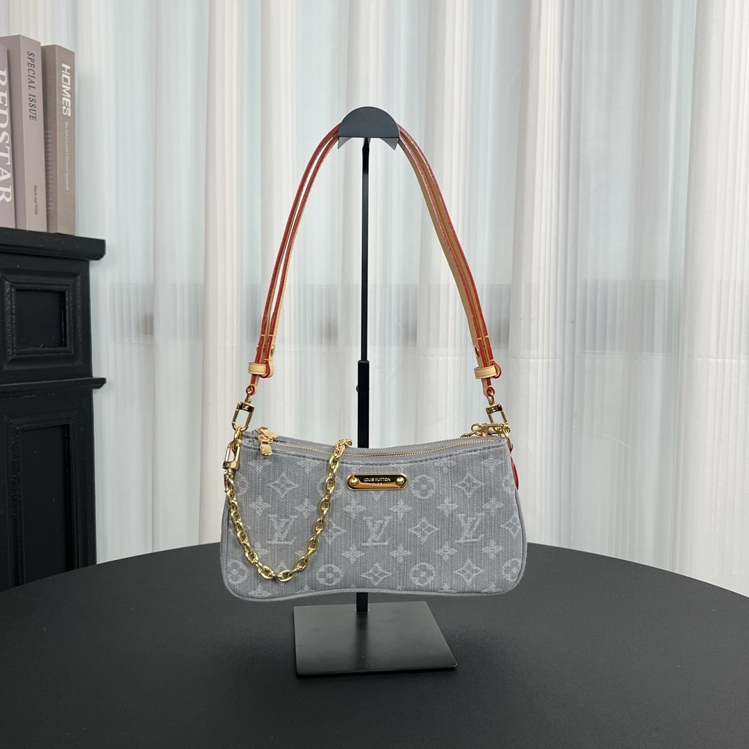 img_7073-1.jpeg Louis Vuitton Liv Pochette in Washed Denim - Image 1