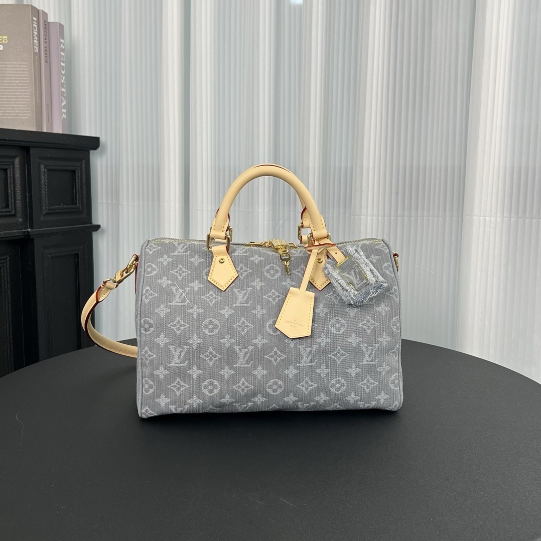 img_7080-1.jpeg Louis Vuitton Speedy Soft 30 bag in Monogram Denim canva - Image 1