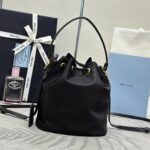 BUCKET BAG 19 IN BLACK RE-NYLON AND CALFSKIN HANDLE - Image 2